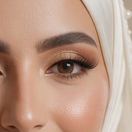 A bride’s eye with soft golden eyeshadow